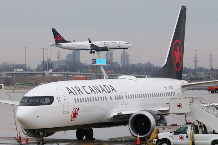 Air Canada asked two stangers to share a hotel due to a missed flight