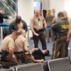 Passenger arrested after forcing himself onto American Airlines flight