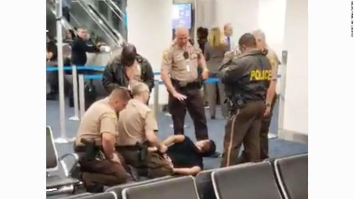 Passenger arrested after forcing himself onto American Airlines flight